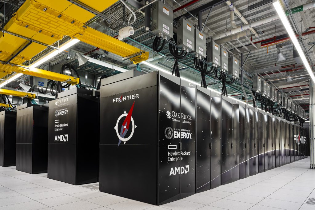 Oak Ridge Leadership Computing Facility — row of Frontier supercomputer cabinets, HPE Cray EX with AMD silicon